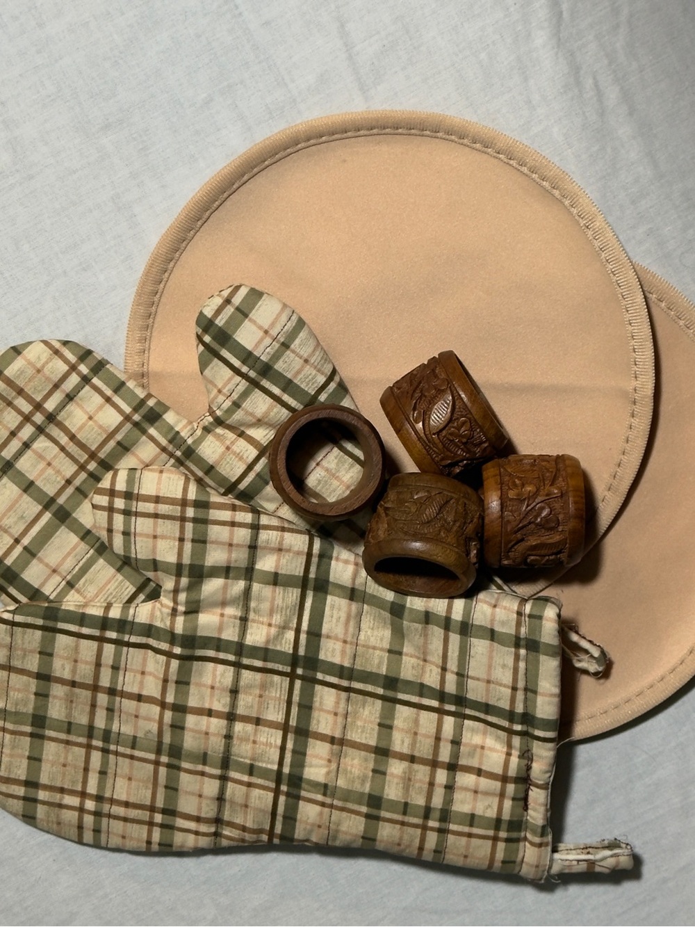 Hand-Carved Wooden Napkin Rings and oven mitts – Brown